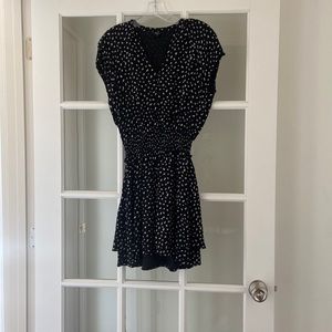 Crème dot and black dress